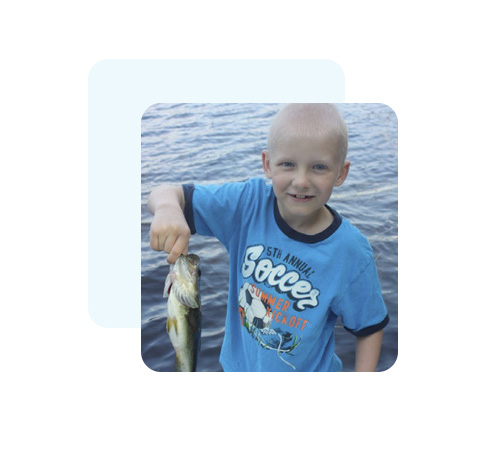 Keaton holding a fish